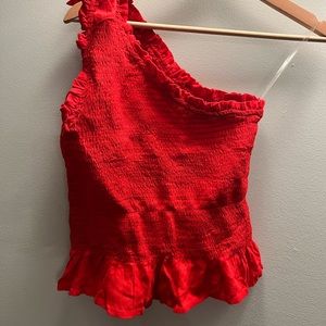 bright red one shoulder top